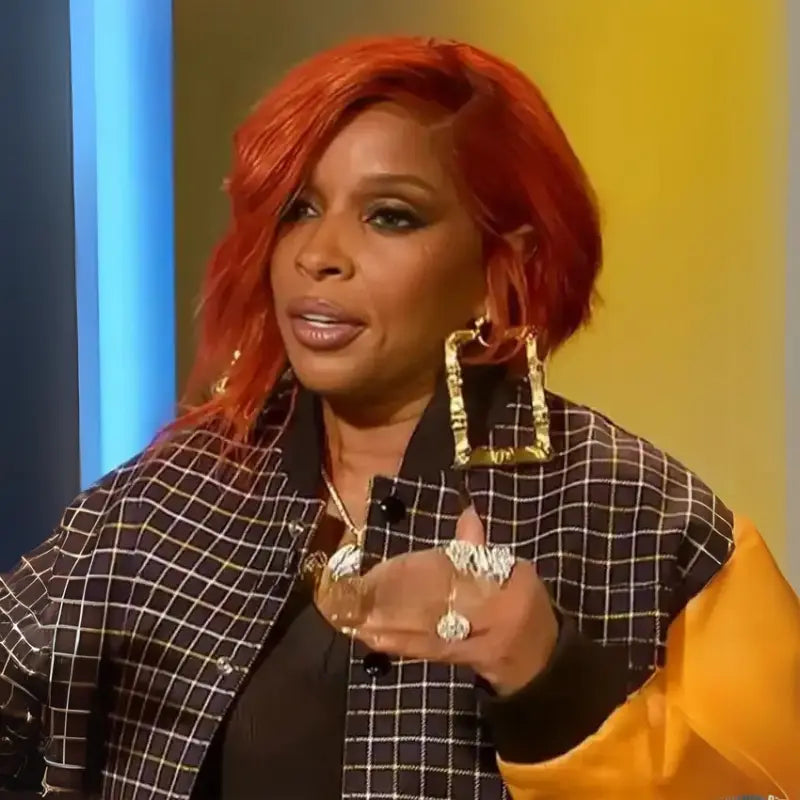 Back view of Access Hollywood Mart J. Blige checkered varsity jacket with orange genuine leather sleeves