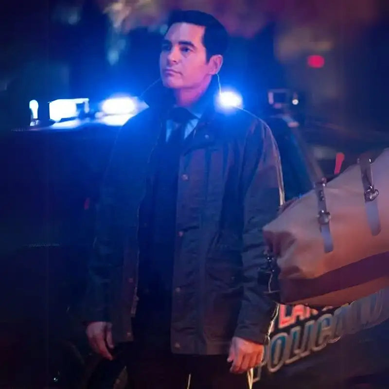 Ramon Rodriguez wearing the black jacket from Will Trent series, showcasing its sleek design and functional details
